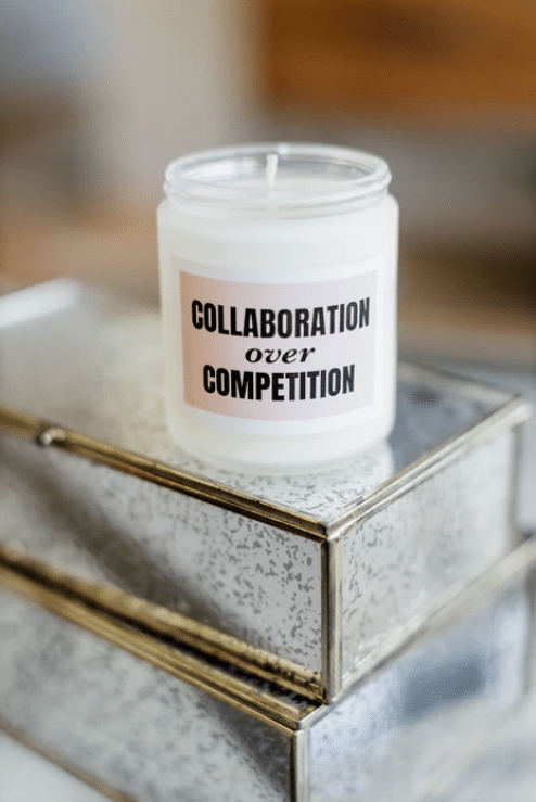 Collaboration over competition candle